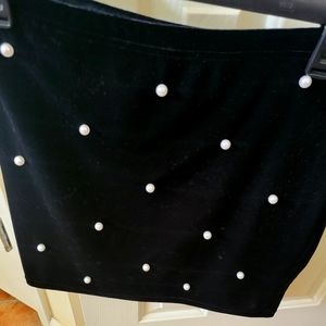 Black mini skirt with pearl detail